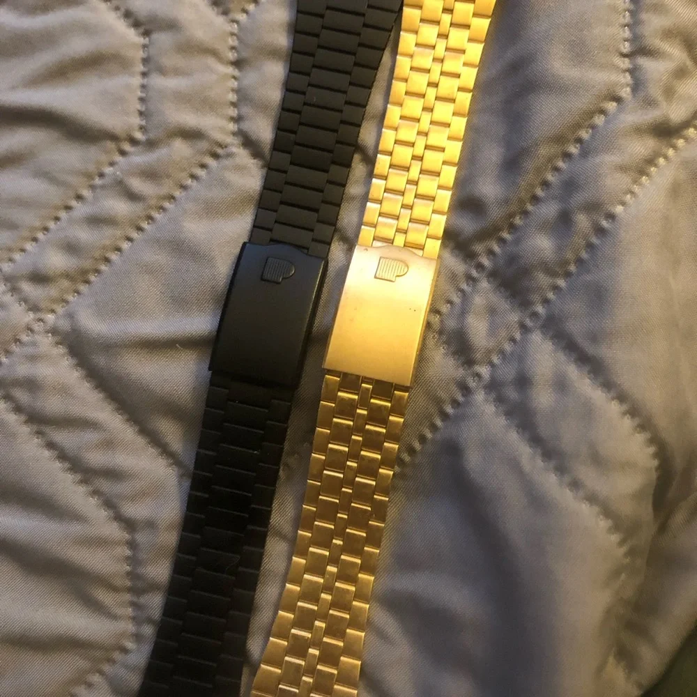 Gold and Black Smartwatch Cases with Classic Link Design